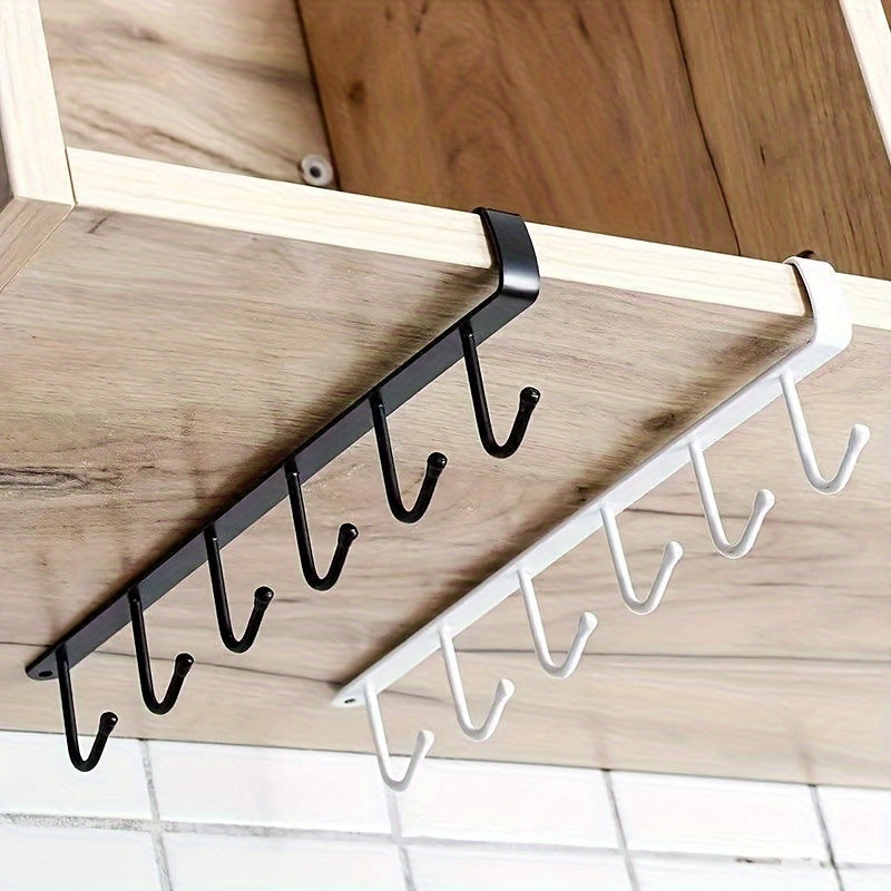 Simple to install, these cast iron hooks have a seamless, nail-free design that is ideal for organizing your kitchen and wardrobe. They are perfect for hanging clothes, cups, and storing glassware.