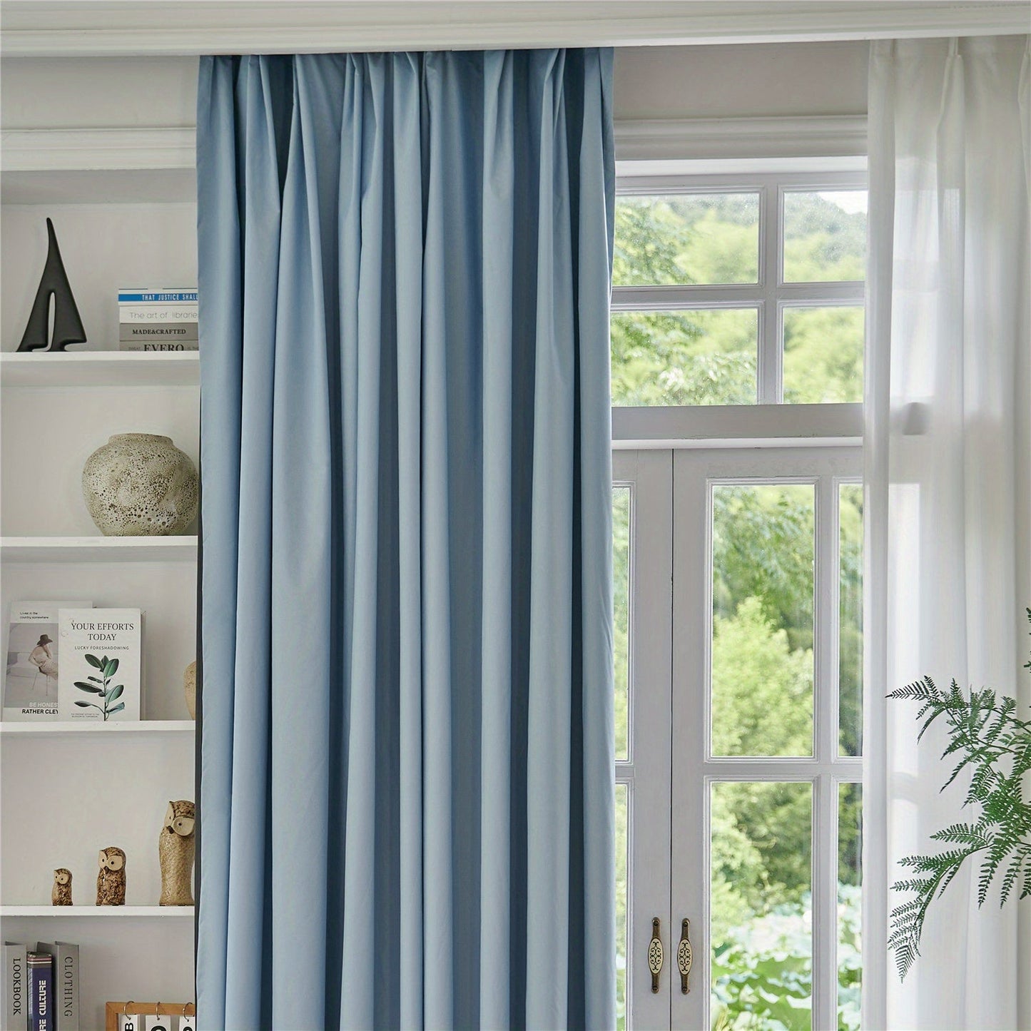 Blackout curtains in black or white color options available for bedroom and living room. These thermal lined curtains are insulated and light blocking, reducing noise in the room. Perfect for use in various rooms including living rooms, bedrooms