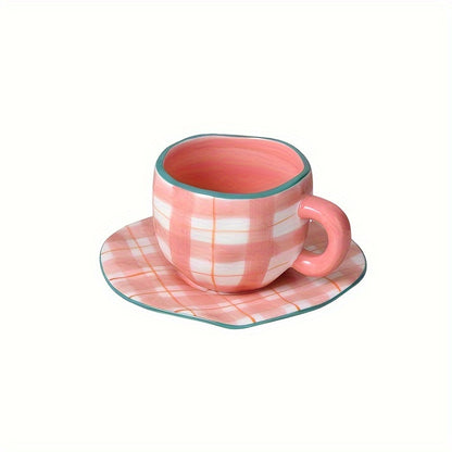 Handcrafted ceramic coffee mug and saucer set with whimsical patterns. Reusable and recyclable, perfect for tea or latte. Hand wash only.