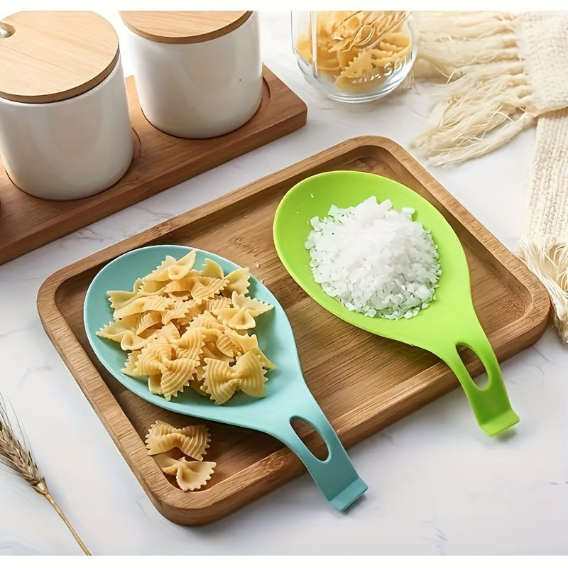 Silicone spoon rest for kitchen utensils - Easy to clean, heat-resistant holder for spoons and seasonings.