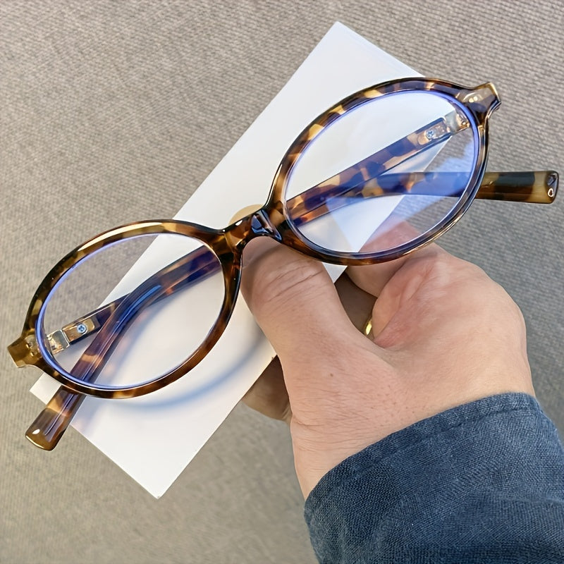 Leopard print small frame glasses with Y2K style, blue light blocking for tech use, ideal for parties.