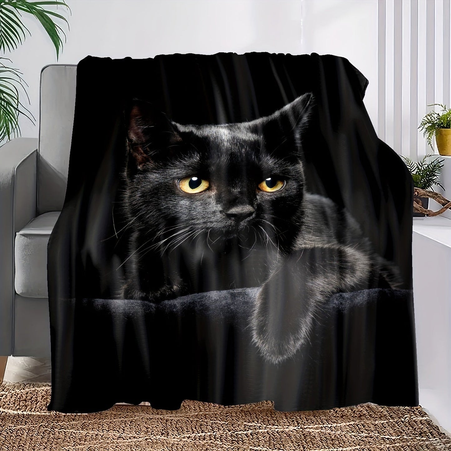 Soft and warm, this black cat print flannel blanket is perfect for cuddling up on the couch, in the office, or while camping or traveling. It also makes a great holiday gift for anyone who loves cozy blankets.