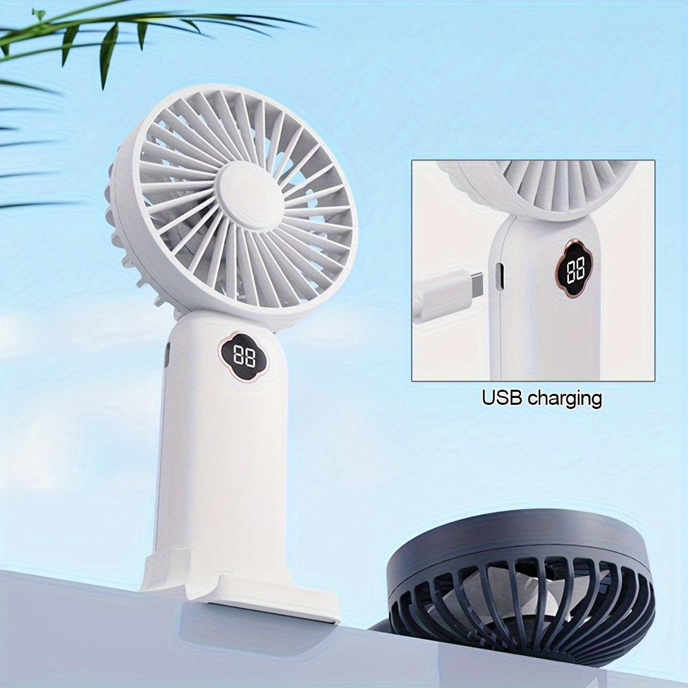 Essential for the summer season, this handheld mini fan with a 1200mAH battery pack is perfect for staying cool during outdoor activities. Measuring 19.71*8.99cm, this silent small fan is a must-have for back-to-school supplies, RV trips, camping