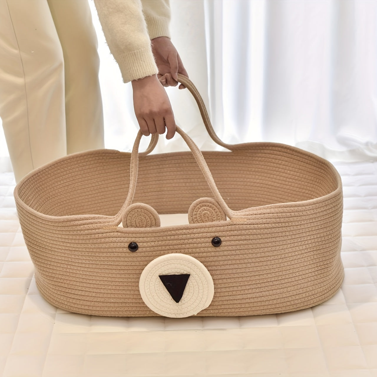 The LA DEARCHUU Portable Baby Crib features a charming Bear Design and a Foldable Fabric Cradle. It also includes a Multifunctional Weaving Storage Basket in Beige/Khaki. This product does not require batteries and is suitable for Newborns up to 3 years