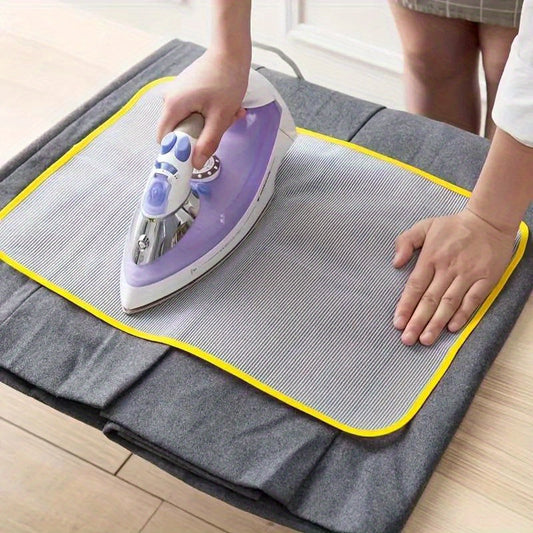 Get the Premium Ironing Cloth Pad for safe and efficient ironing. This heat resistant, scorch proof pad features an insulation mesh design that protects your iron and board. Easy to clean and available in random colors, this home essential is a must-have