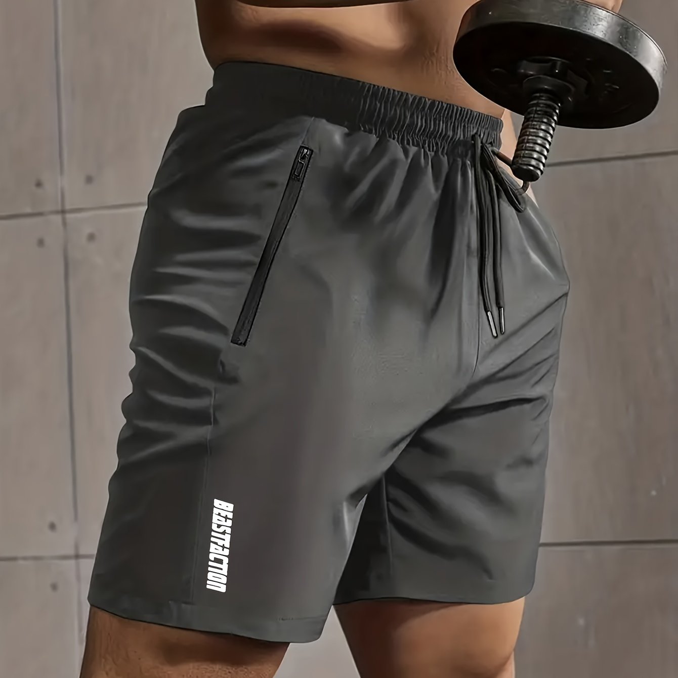 Solid men's shorts with zipper pockets, elastic waist drawstring for summer fitness.