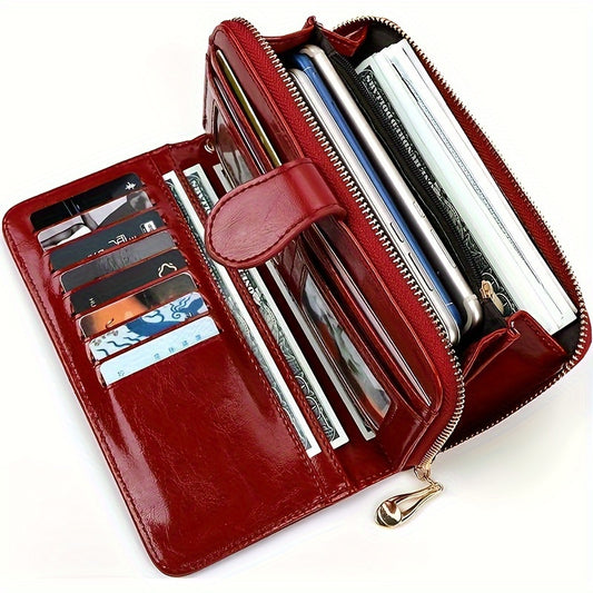 Red synthetic leather wallet with wrist strap, large capacity for cards, zipper closure, polyester lining - ideal for everyday use, contemporary and durable.