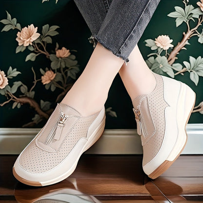 Beige perforated women's casual sneakers with zipper detail, thick sole, and anti-slip features.