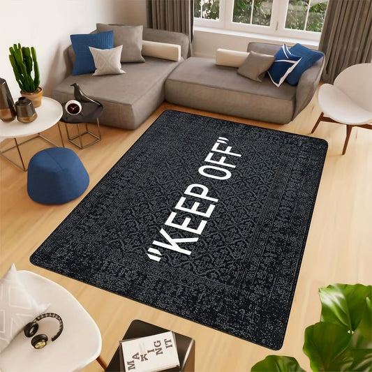 One piece of a black printed soft area rug with the message "Keep Off" - designed for living room and kitchen decor. This non-slip, stain-resistant floor mat has a thickness of 480g/m².