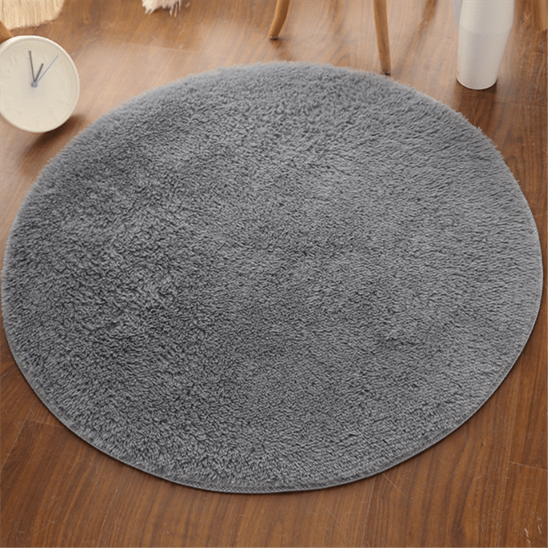 Soft, machine washable plush round area rug perfect for bedroom and living room decor - cozy and fluffy for maximum comfort.