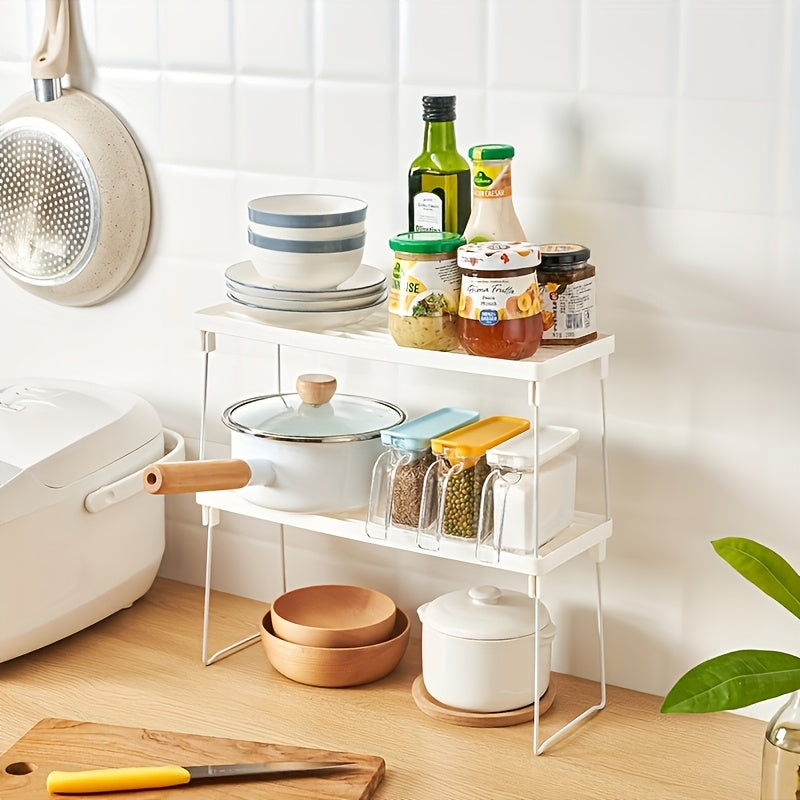 Modern Multi-Functional Desktop Organizer:
- Foldable open shelf stand
- Can be used for kitchen utensil storage
- Space-saving home organization solution
- Made of durable plastic
- No electricity needed