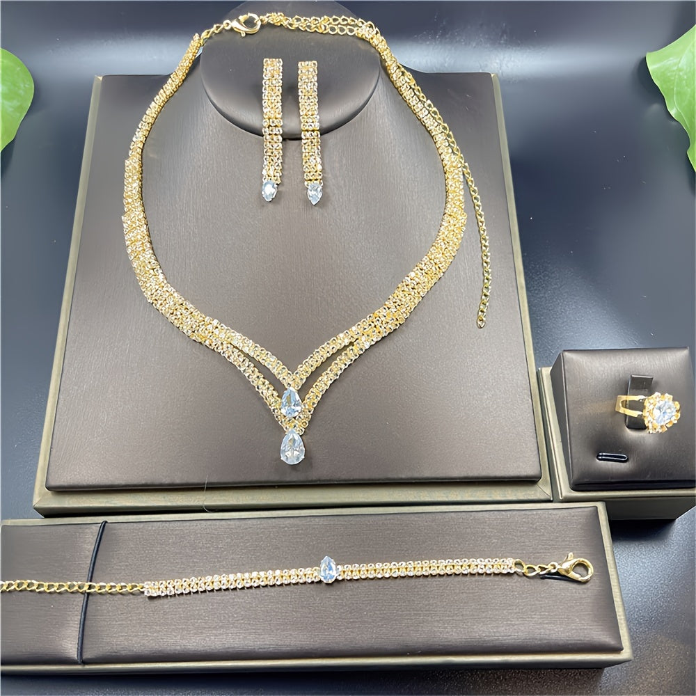 Sophisticated 4-piece Bohemian Jewelry Set featuring Shimmering Rhinestone Teardrop Pendants - Ideal for Weddings & Parties. Set includes Necklace, Earrings, Bracelet, and Ring.