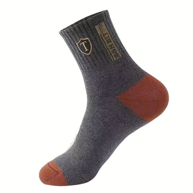 6 pairs of versatile mid-calf men's socks, ideal for sports and casual wear, designed for sweat absorption.