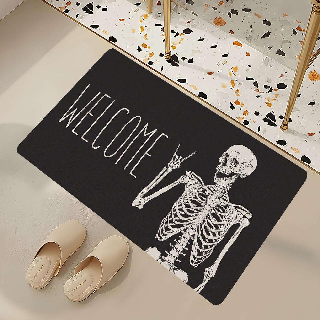 Welcome guests with this Halloween-themed Skull Doormat, designed for both indoor and outdoor use. This non-slip rug is easy to clean, stain-resistant, and low pile for safe and convenient use. Made of polyester and weighing under 700g/m², this festive