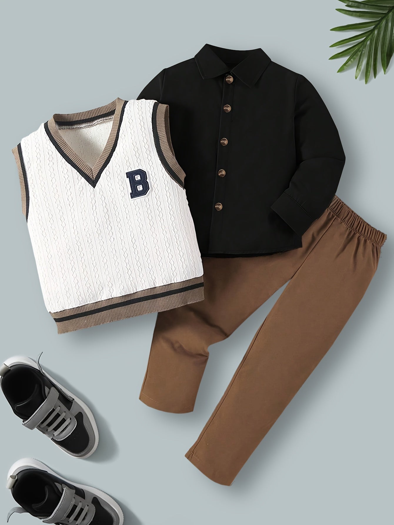 Boy's 3-piece outfit set for casual spring/autumn wear includes button-up cardigan, ribbed sweater vest with contrast trim, and loose-fitting pants for daily and outdoor activities.