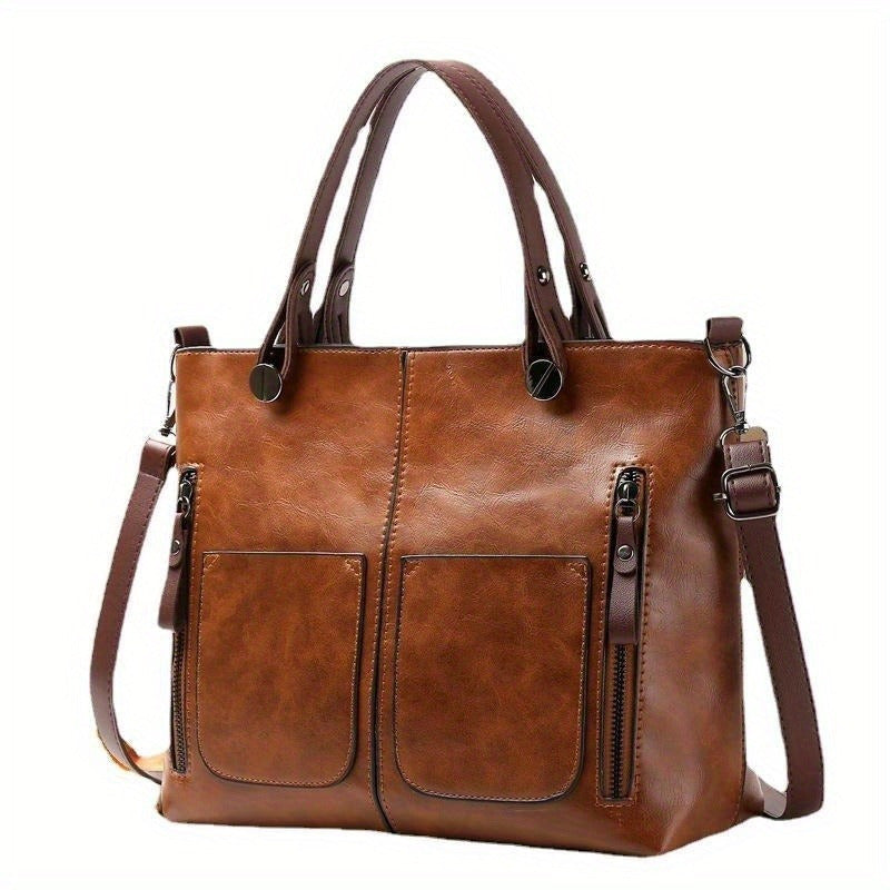 Vintage-style women's tote bag with adjustable strap, large capacity, multiple pockets, zipper closure, deep brown.