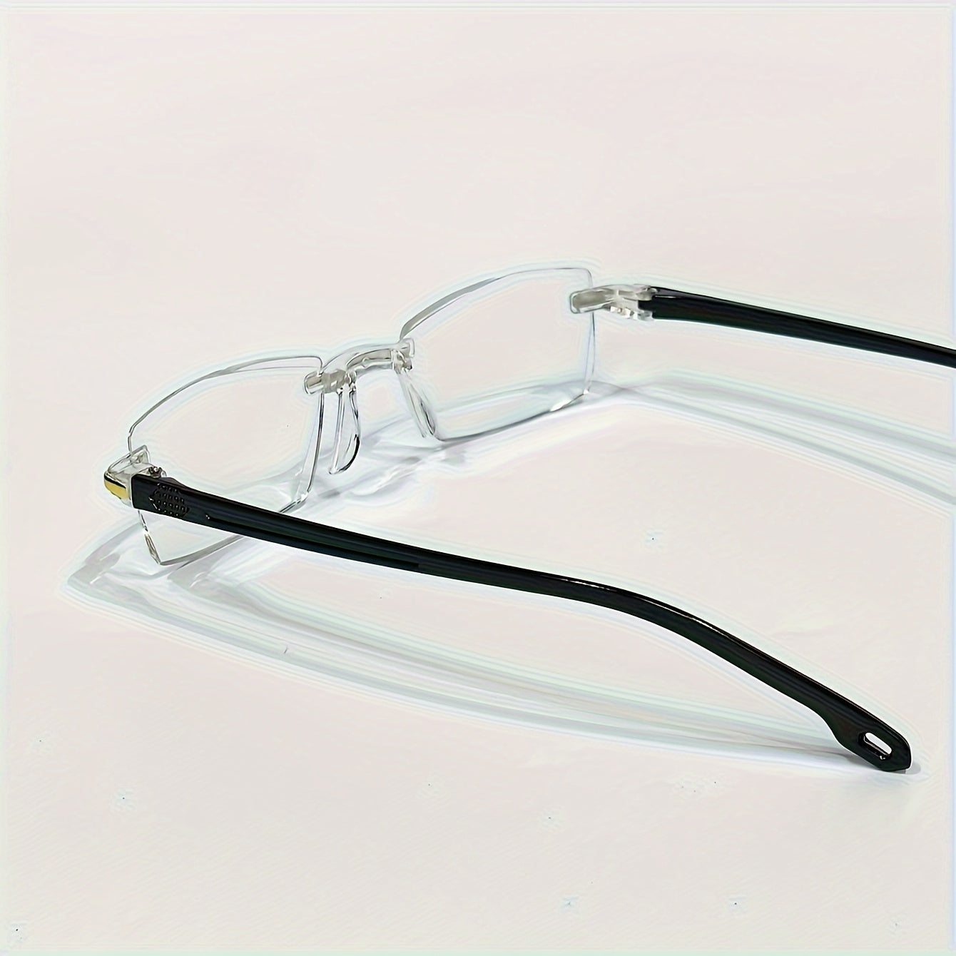 4 Rimless Blue Light Blocking Reading Glasses for Men and Women, designed to reduce eyestrain.