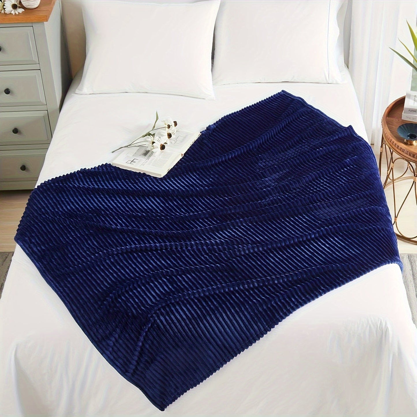 Stay cozy and warm with our Ultra-Soft Oversized Fleece Throw Blanket. Made with lightweight and warm 280GSM microfiber, this blanket features a 3D ribbed Jacquard design for added style. Hypoallergenic and perfect for all seasons, this blanket is a