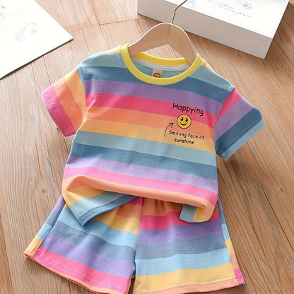 Summer fashion set for girls: Cute T-shirt with joyful face & letter print paired with striped shorts. Made of cotton blend, machine washable, ideal for outdoor activities.