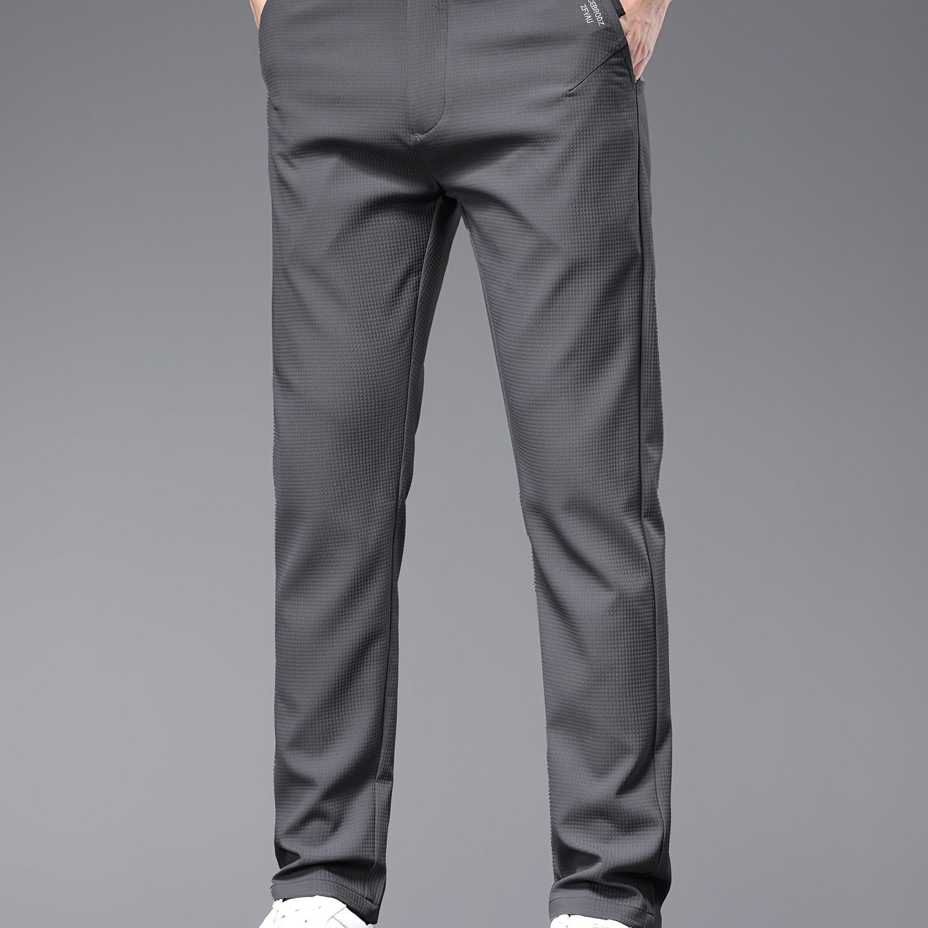 Men's slim fit pants with pockets, perfect for outdoor activities in spring and autumn.