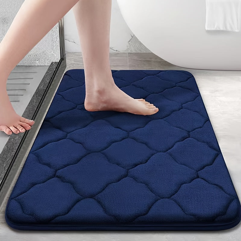 Soft plush bathroom mat with non-slip, absorbent, and machine washable features. Made of cozy coral fleece with a cute short pile design for a comfortable toilet experience.