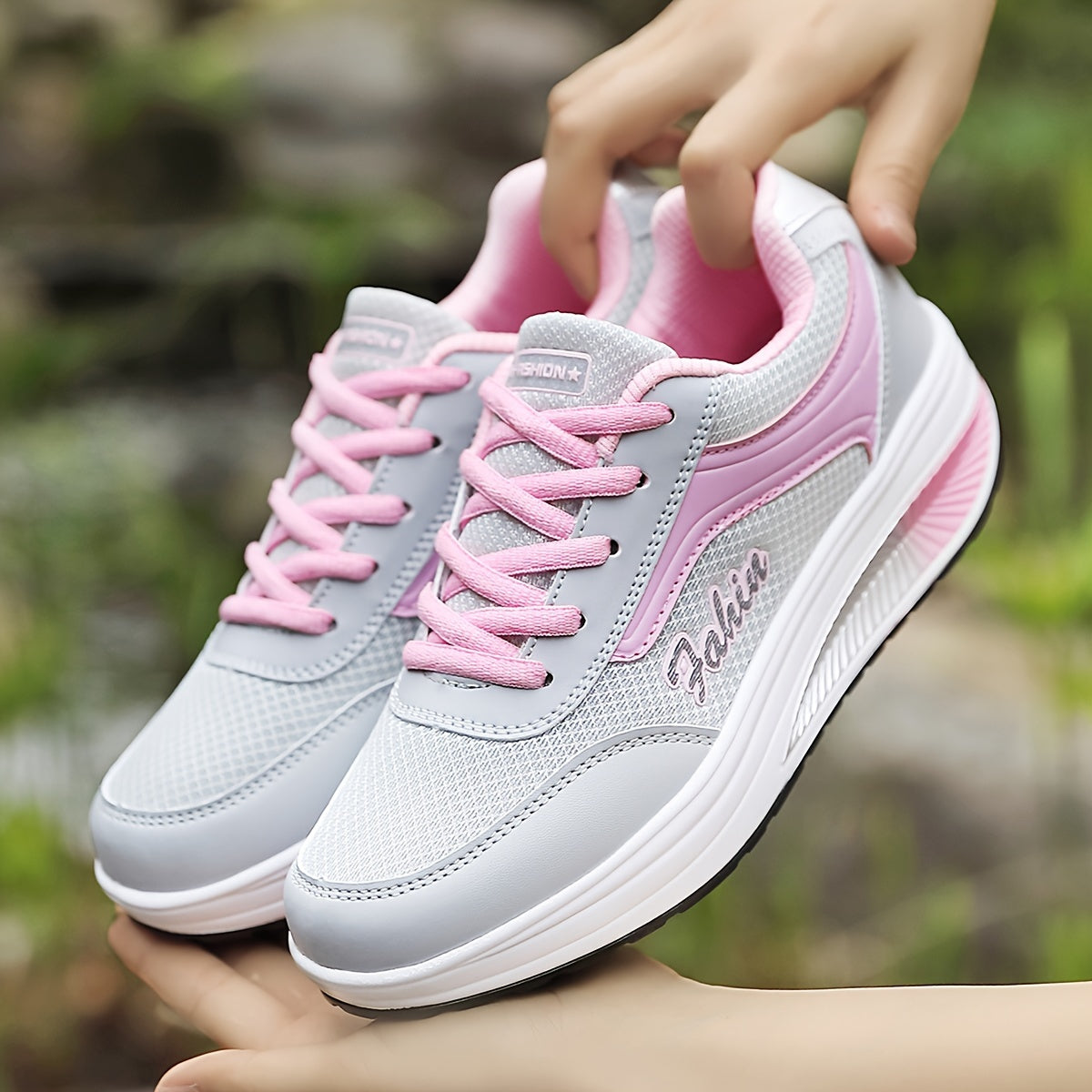 Women's platform sneakers with breathable mesh, lace-up design, and comfortable fit in plus size