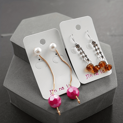 Set of 20 pairs of dangle earrings adorned with dazzling rhinestones, featuring an elegant and classic style. Crafted from zinc alloy, these trendy accessories are perfect for adding a touch of sophistication to any outfit. Ideal for fashionable women