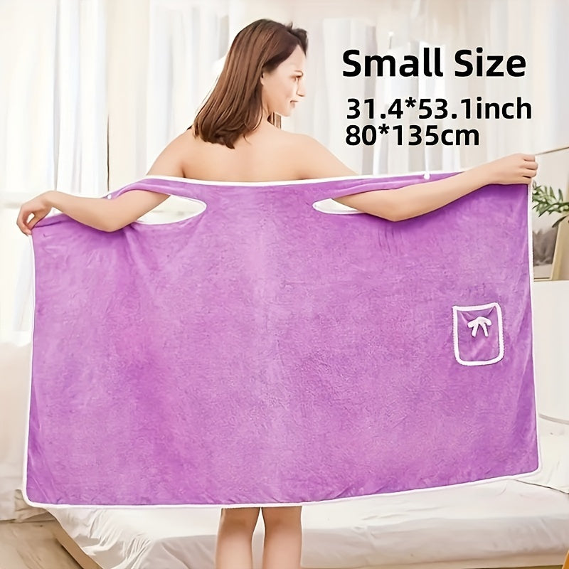 Soft coral velvet wearable bath towel with bow detail, ideal for bathroom and beach use. Thich, absorbent, quick-dry, pink with white border. Durable woven texture. Perfect for everyday comfort.