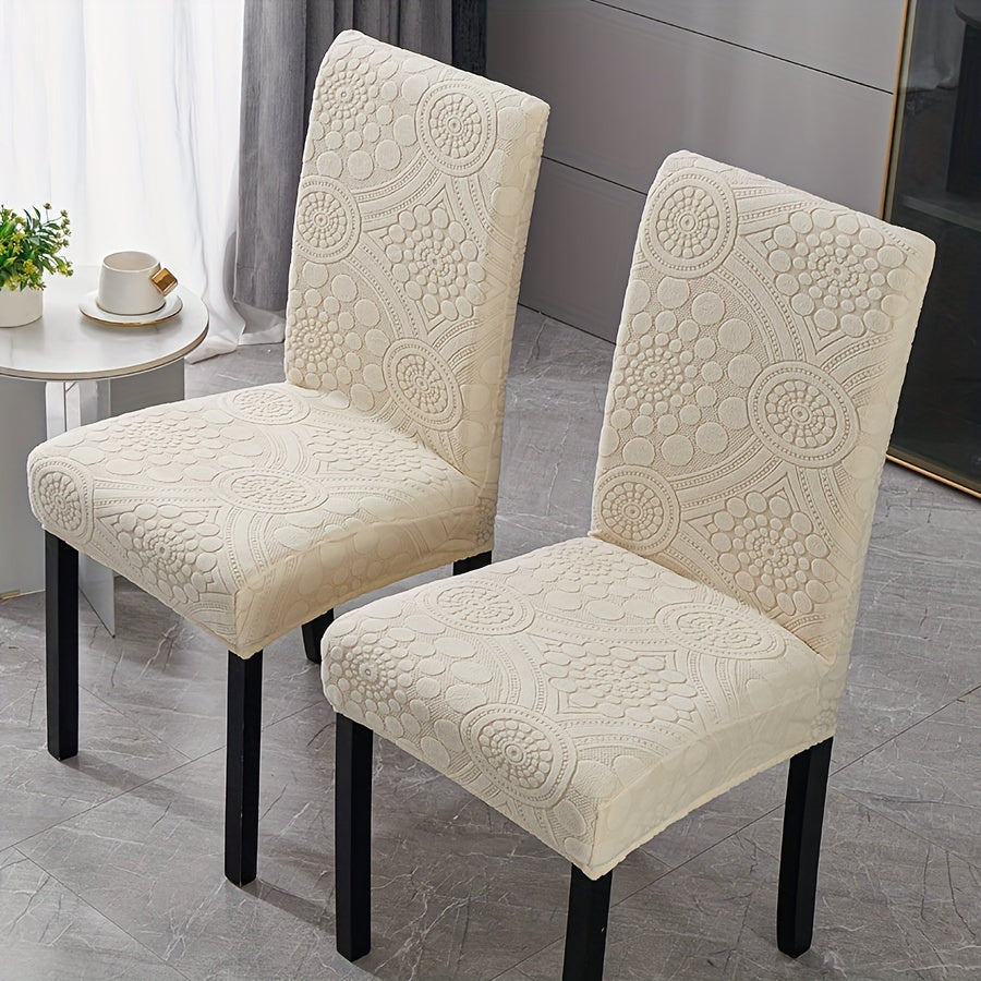 Boho style chair slipcovers available in sets of 6, 8, or 10. Made of stretch jacquard fabric with a slipcover-grip feature, these waterproof and machine washable polyester covers are designed for dining, office, banquet chairs, and home decor. Easy to