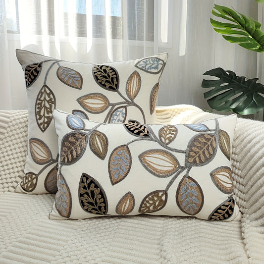 Leaf embroidered canvas throw pillow cover with zipper, machine washable, for modern living room and bedroom decor.