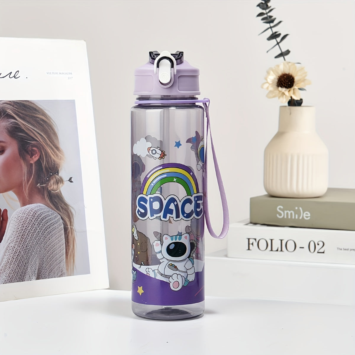 Vibrant astronaut-themed water bottle, perfect for camping, travel, sports, and fitness, makes a great gift.