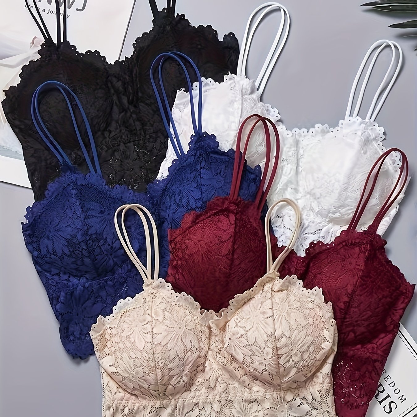 5 floral lace wireless bras for women, full cup with polyamide and spandex knit fabric, mature style with contrast lace detail and removable padding.