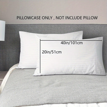 A pair of striped pillowcases made from soft, breathable woven polyester. These pillowcases are machine washable and have a sanded finish for added comfort. They do not include a pillow insert and are made from non-printed lightweight fabric with a 90gsm