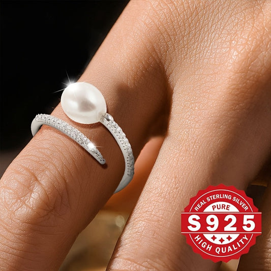 This elegant freshwater pearl ring for women is crafted from S925 sterling silver and adorned with artificial zirconia and freshwater pearls. Its stylish clash design makes it a unique gift option for festivals. Suitable for all occasions, this