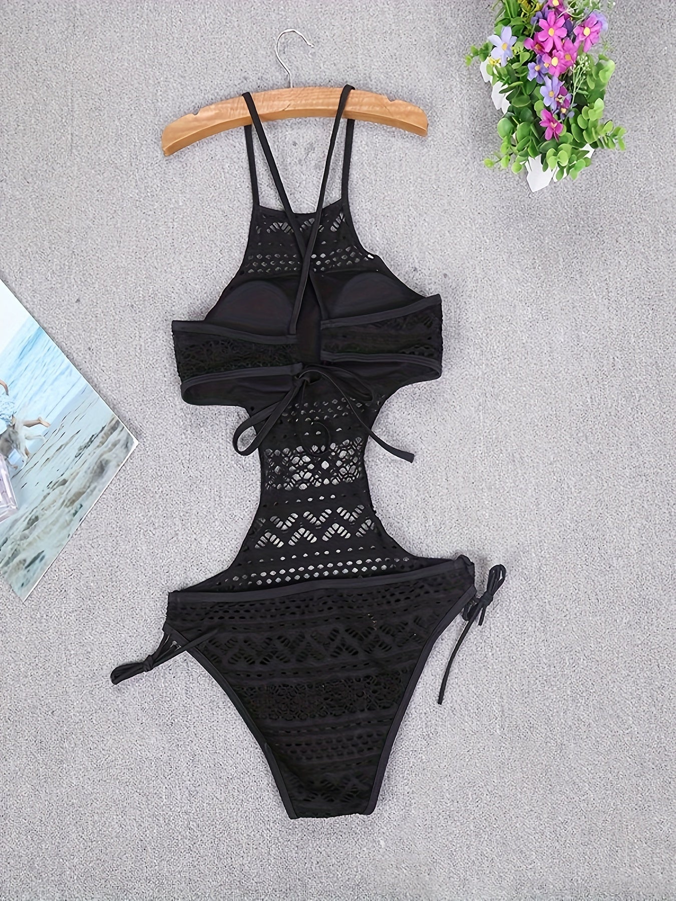 Stylish lace one-piece swimsuit with cutout design, removable pads, stretch fabric, and machine washable.