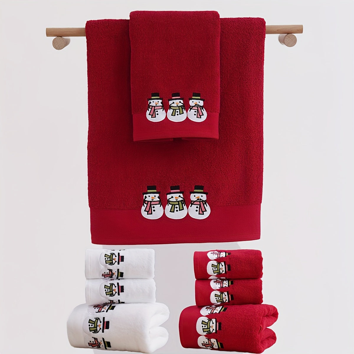 Christmas-themed towel set with embroidered snowman design. Includes 2 towels and 1 bath towel, ideal for couples' bathroom essentials and holiday gifts. Made of 100% cotton.