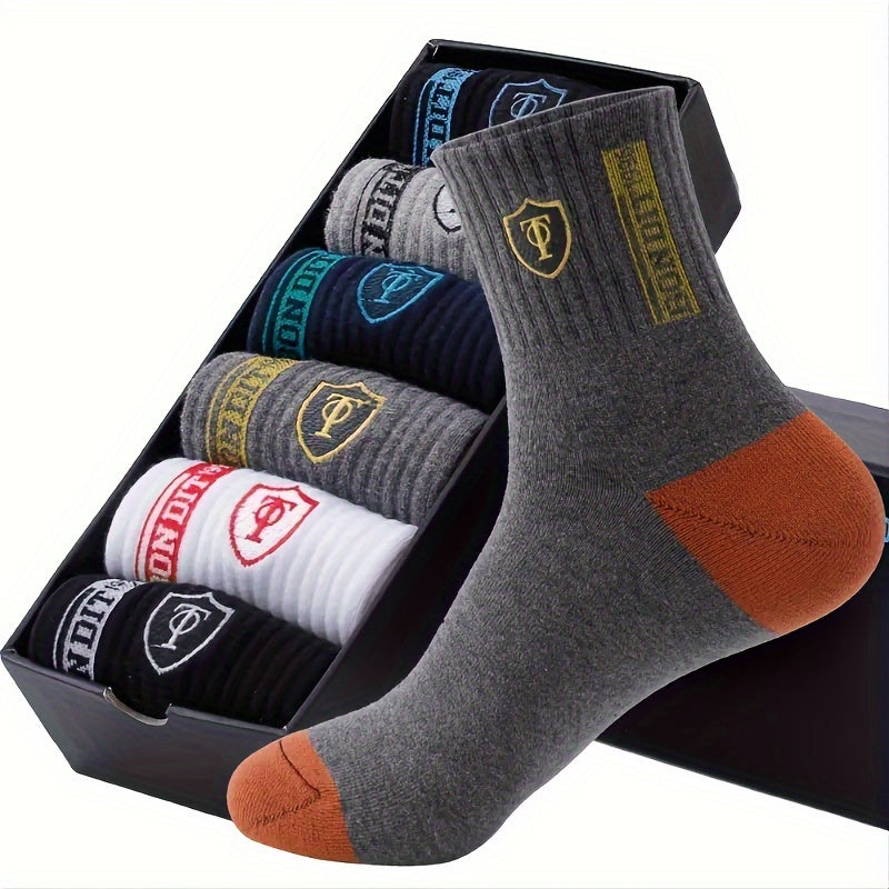 5 pairs of comfortable, trendy crew socks for men, breathable and soft for casual wear.