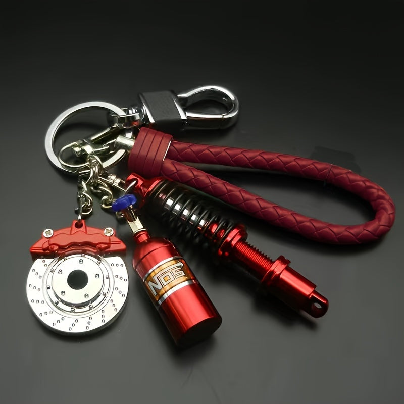 Keychains featuring car parts for car enthusiasts, stylish collectibles including black turbo, silvery gearbox, rainbow tire edges, red brake discs, and red spring shock absorbers. Perfect gifts for boyfriend car lovers.