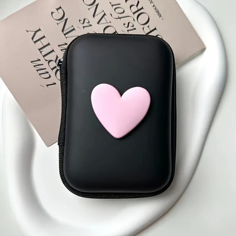 Heart-shaped PU leather case for earphones and charger with zipper closure. Features anti-fall design, cable organizer, and no battery required.