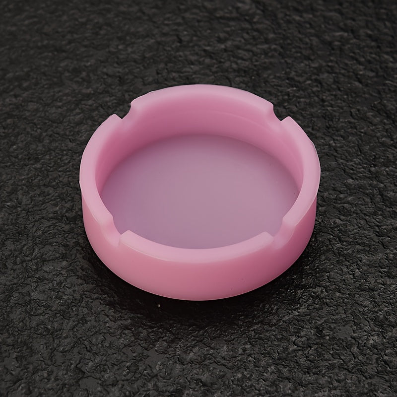 Round silicone ashtray for home or office use, suitable as a gift.