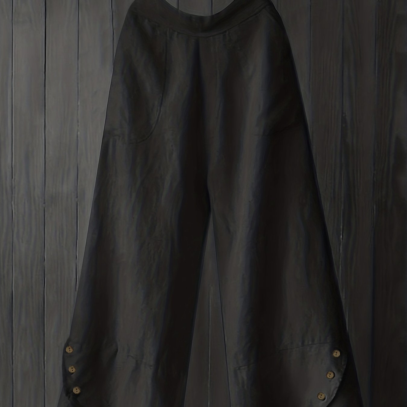 Green high-waist wide leg pants with unique button details, loose fit, pleated design, ideal for fall outings.