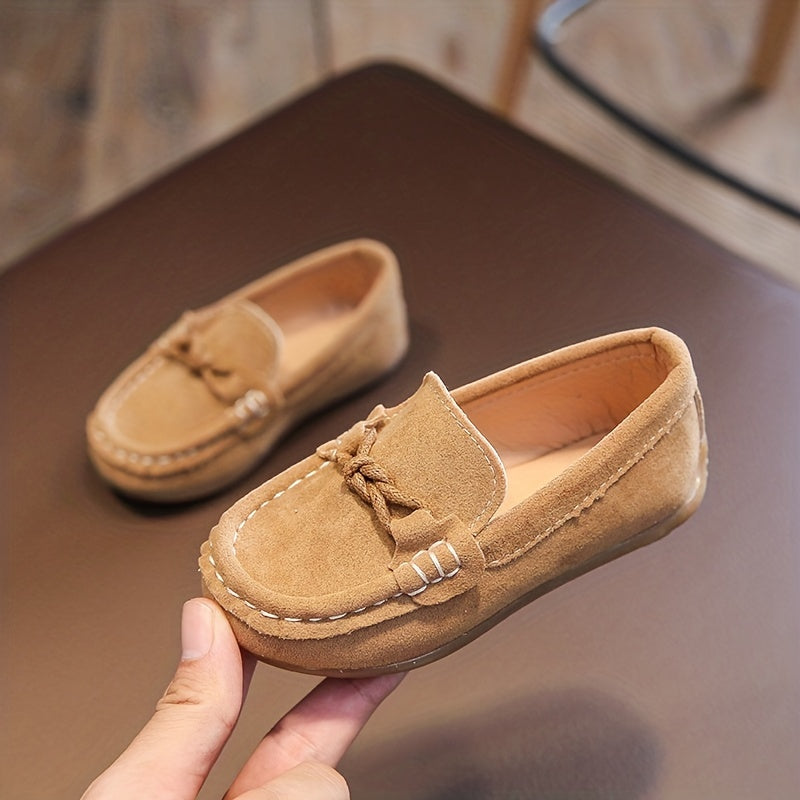 Kids slip-on loafers with soft upper, non-slip sole, breathable lining, bowknot detail, ideal for casual walking indoors and outdoors.