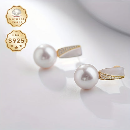 Surprise someone special with this must-have gift box containing a pair of fashionable dangling earrings for women. Made with S925 silver and featuring lustrous 11-12mm round natural freshwater pearls, each pair is unique as the natural pearls come in