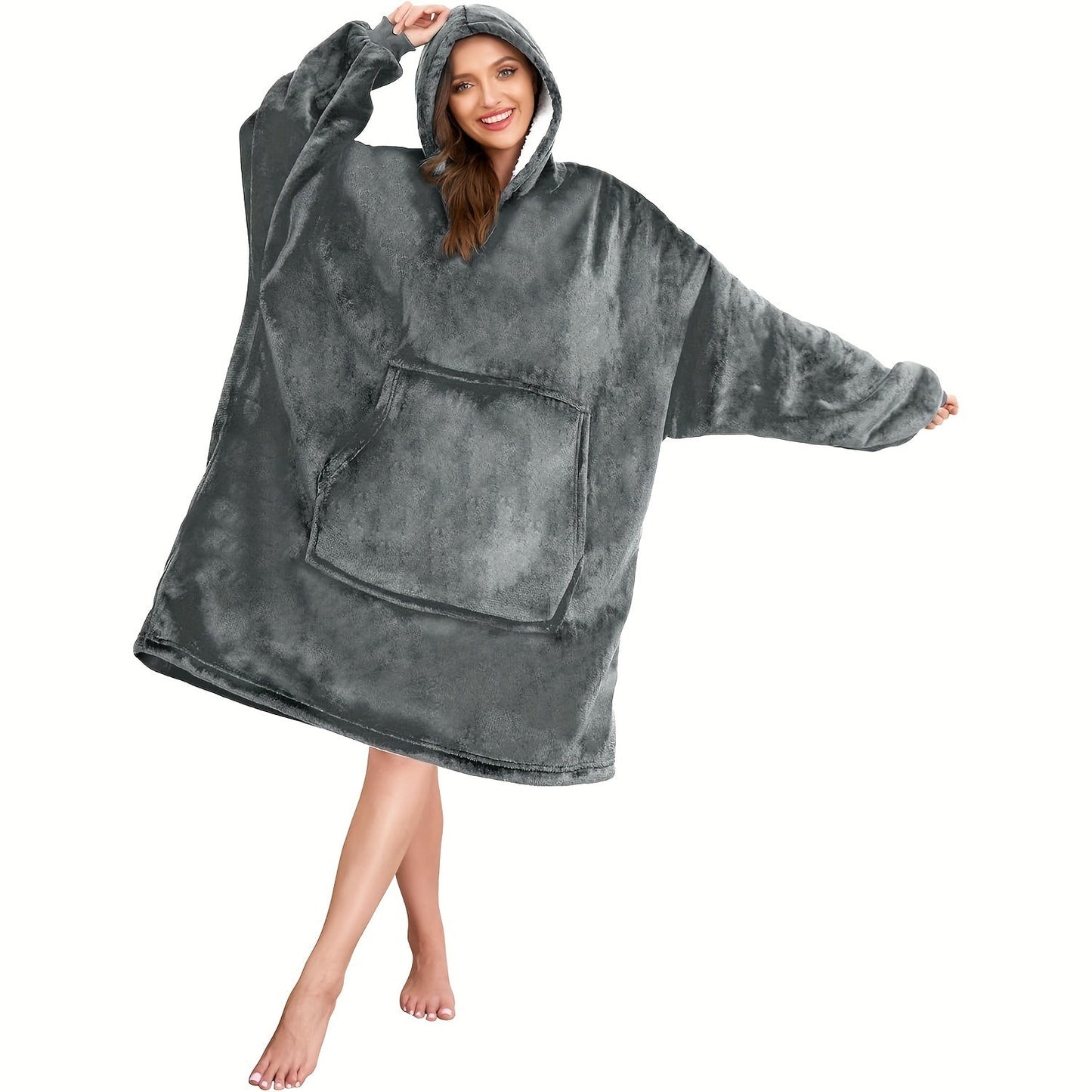 One piece of an oversized hooded blanket made from super soft flannel fabric. This wearable blanket features a stylish hood and a convenient pocket, providing warmth and comfort in cold weather.