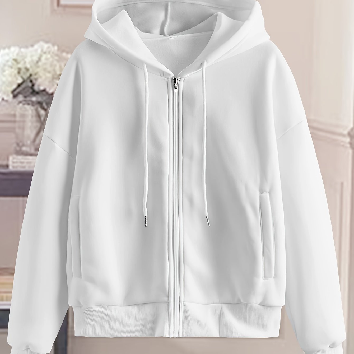 Women's stylish white zip-up hoodie with geometric pattern made of polyester. Machine washable and dry cleanable. Perfect for spring/summer/fall.