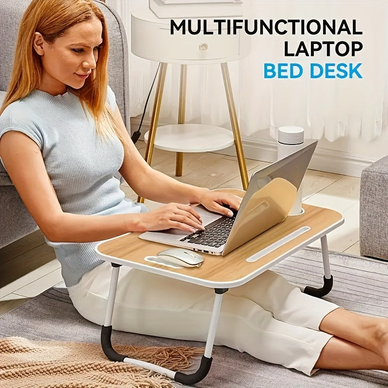 Large portable laptop bed table with cup holder and drawer, ideal for eating, reading, and writing in bed or on sofas.