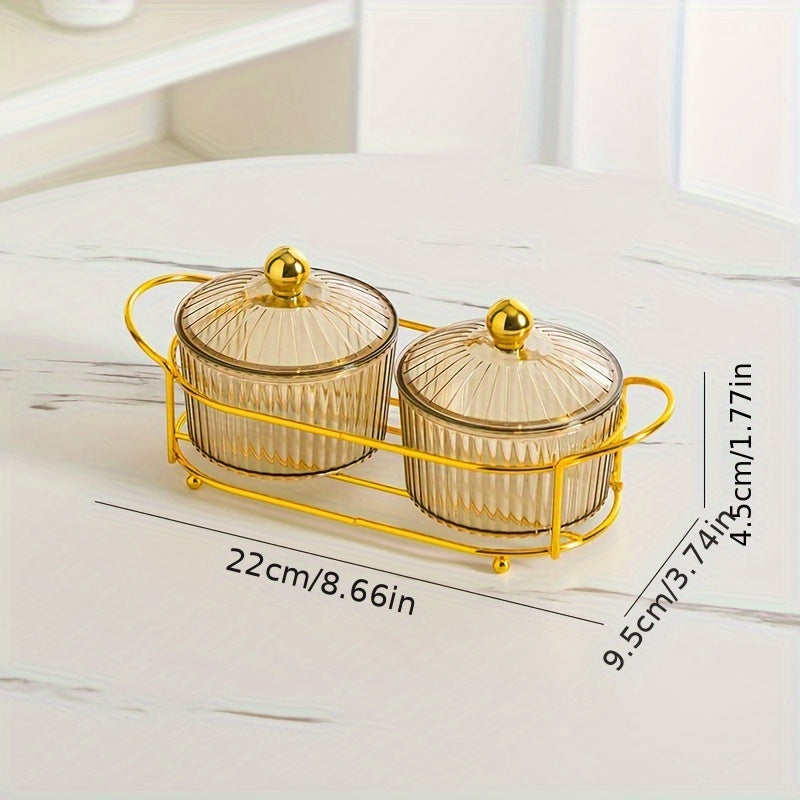 Luxurious snack serving set with lid-covered plastic dishes on a golden tray, perfect for displaying dried fruits and candies on a living room coffee table.