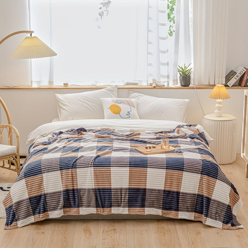 A cozy fleece blanket with whimsical stripes, ideal for snuggling up at work or having a quick snooze.