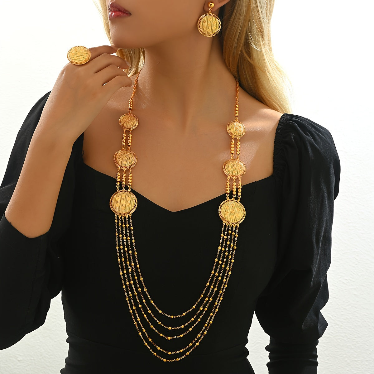 Four-piece set of stylish, luxury tassel jewelry including necklaces, earrings, and rings, perfect for women's banquets, weddings, and special occasions in the Middle East during Ramadan. Ideal for accessorizing, gifting, and adding a touch of elegance