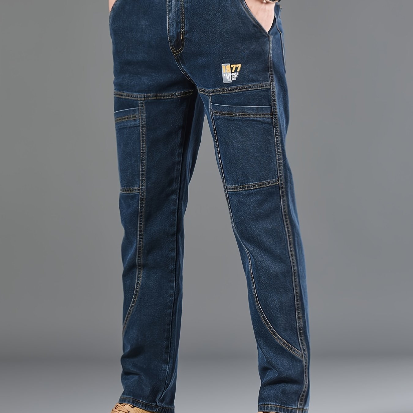 Men's fashion denim jeans made of 70% cotton, 28% polyester, and 1.3% elastane. Features a regular fit, mid waist, zipper fly, and all-season wear. Constructed with 300g/m² woven fabric